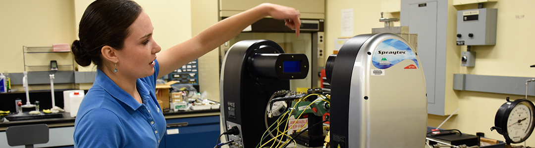 student in combustion lab