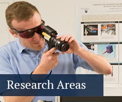 student in intense laser lab