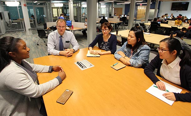 Diandra Prescod and Eric Marsh meet with students