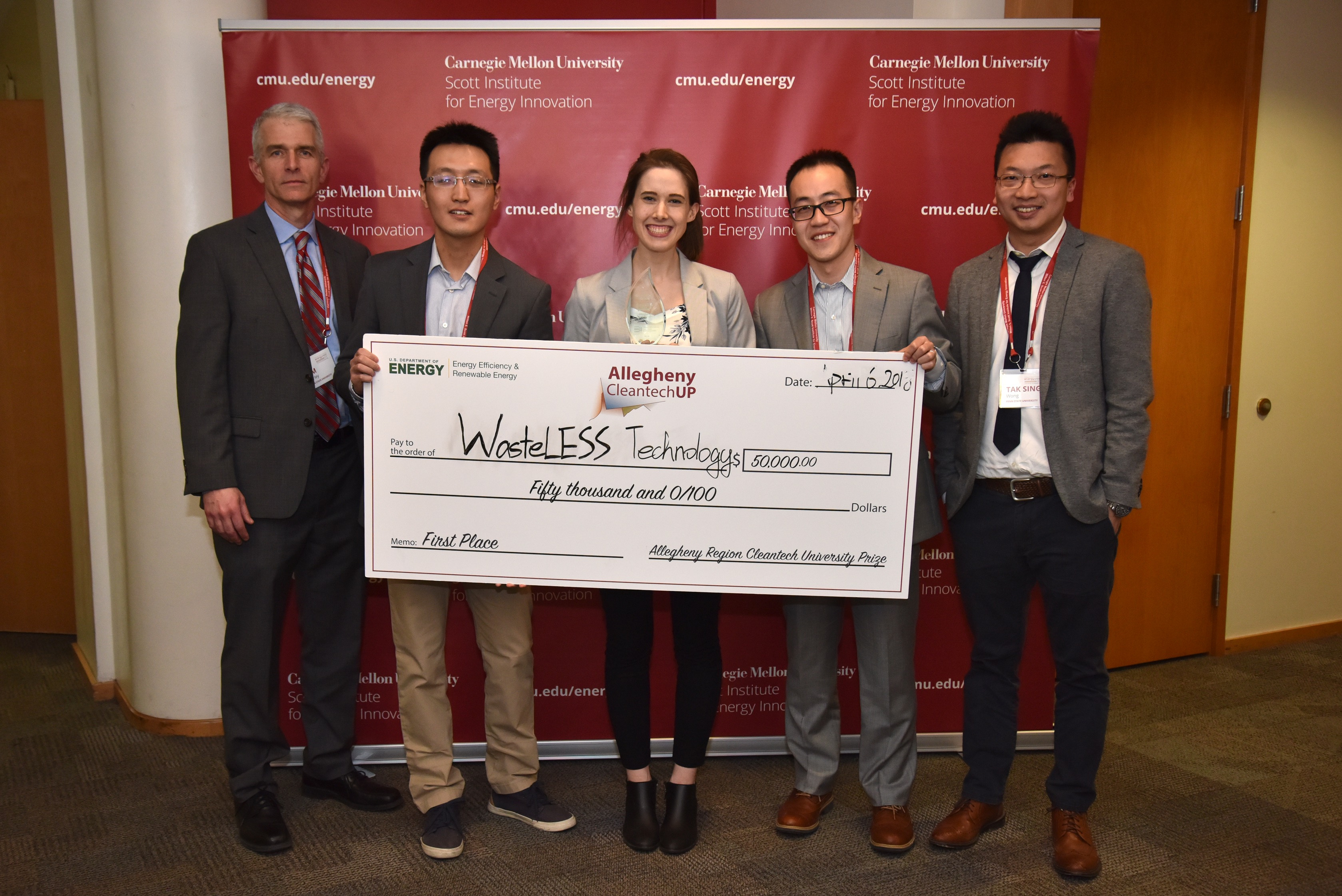 The team's mentor, Tim Hurley, mechanical engineering doctoral students Nan Sun, Birgitt Boschitsch, and Jing Wang, and Tak-Sing Wong, assistant professor of mechanical engineering, with the CleanTech competition grand prize.