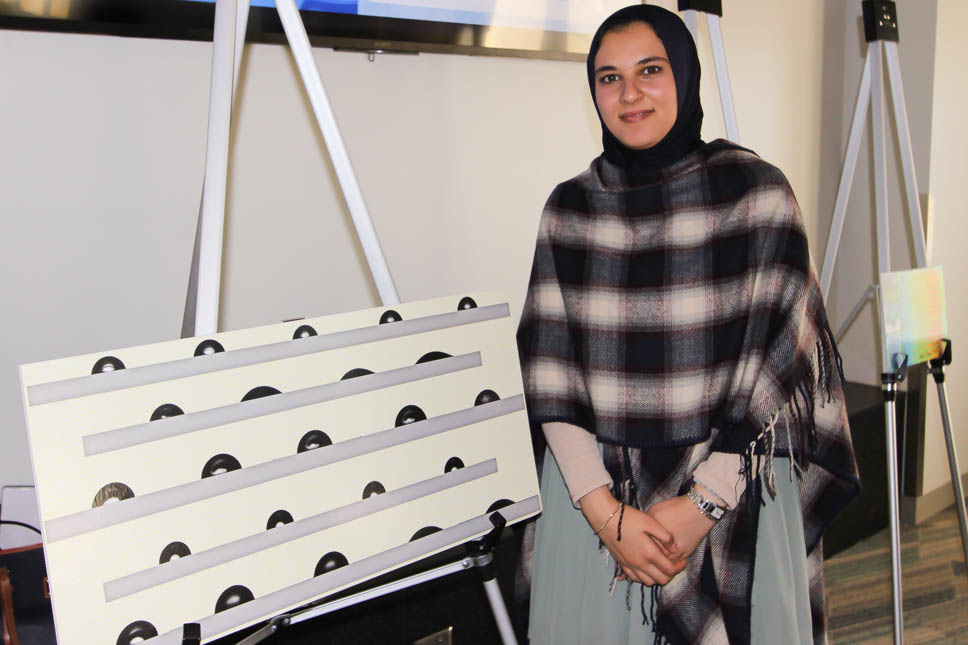 Shikha Ebrahim, a doctoral student, who won second place for her submission, 