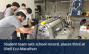 Students working on creating a car for a competition